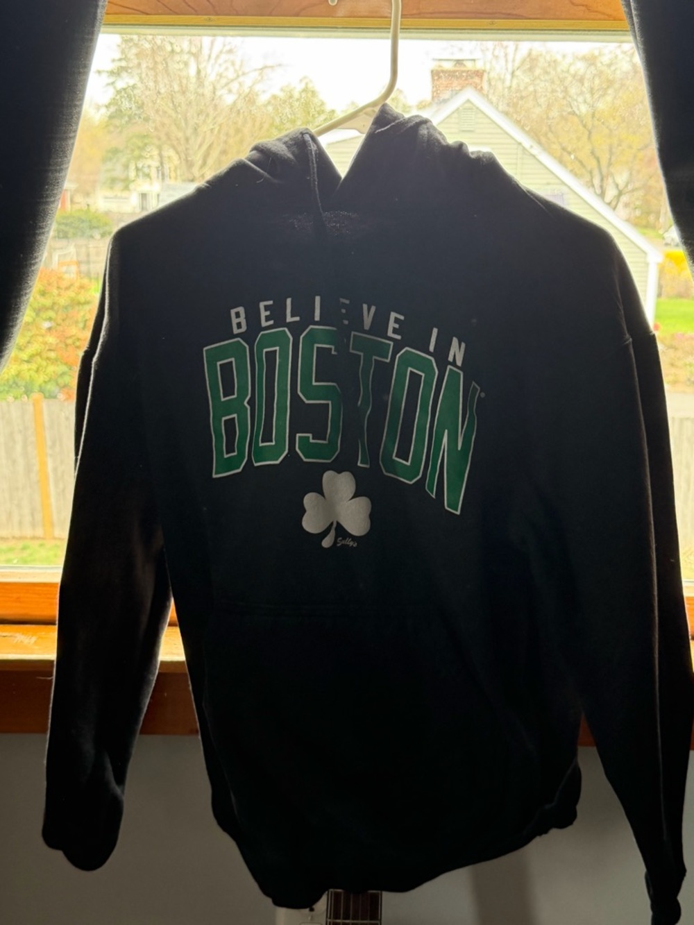 Black 'Believe in Boston' Pullover Hoodie with Green Lettering